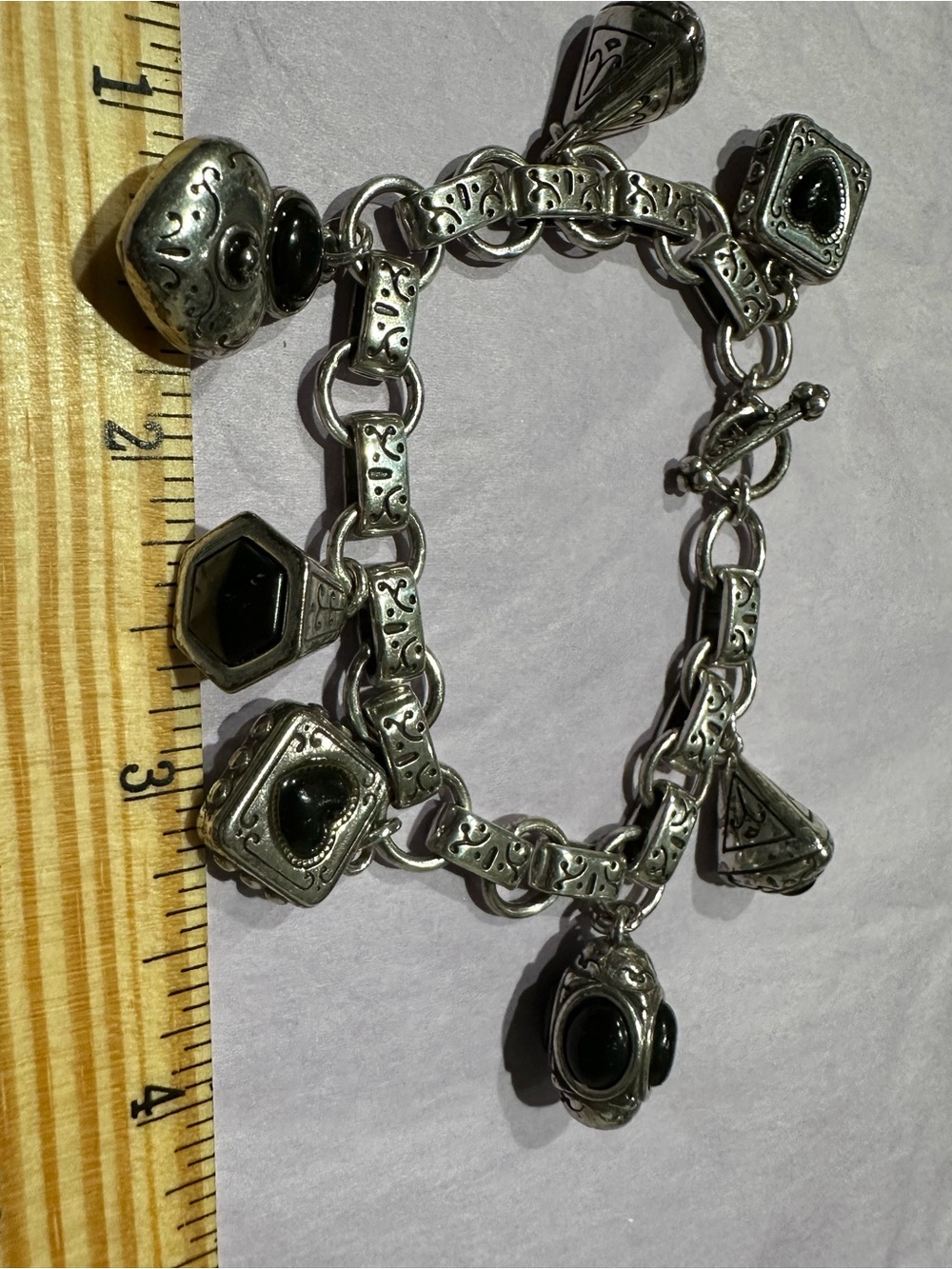 Brighton Silver-Tone Charm Bracelet with Black Accents